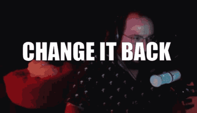 a man wearing headphones and a microphone says change it back