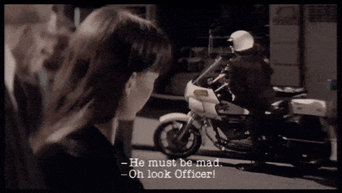 a man riding a motorcycle with the words he must be mad oh look officer