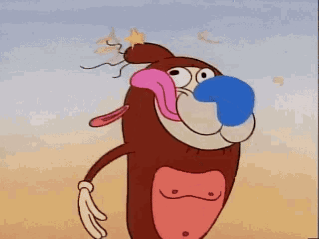 a cartoon dog with a blue nose and tongue sticking out is standing in the desert .