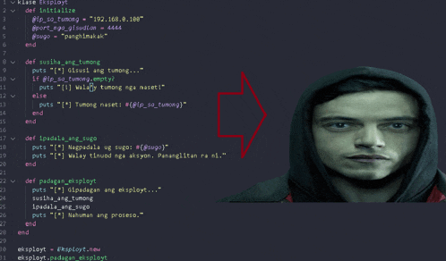 a man in a black hoodie is standing in front of a computer screen with a red arrow pointing to it