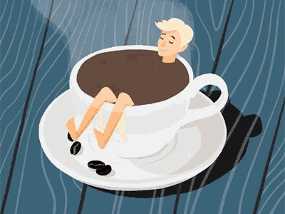 a man is sitting in a cup of coffee