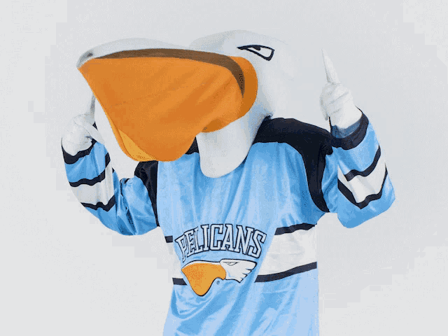 a pelican mascot is wearing a blue pelicans jersey