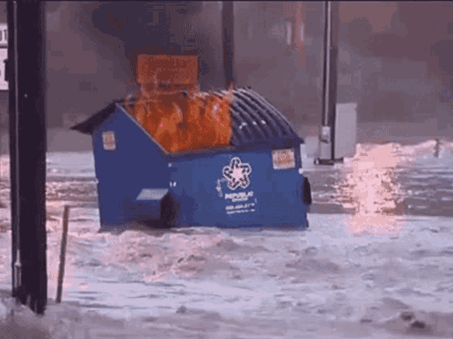 a blue dumpster with republic written on it