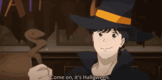 a man in a witch hat is holding a pumpkin and says come on it 's halloween