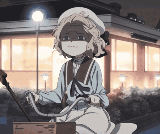 a girl is riding a bicycle in front of a cafe