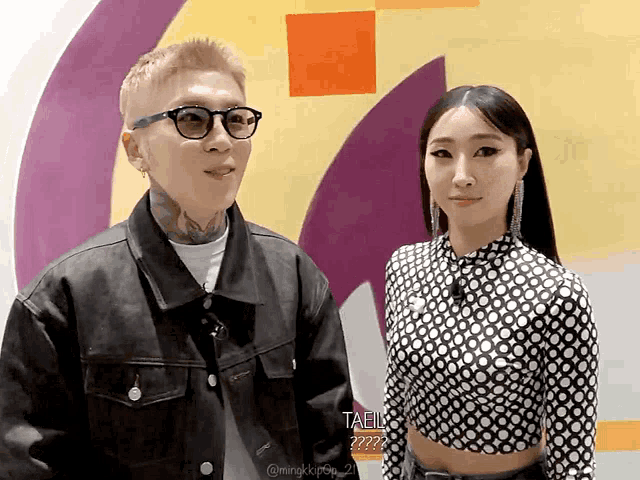 a man and woman standing next to each other with taeil written on the bottom