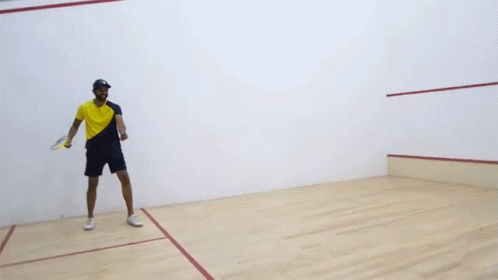 Playing Squash Faisal Khan GIF - Playing Squash Faisal Khan Hit The Ball GIFs
