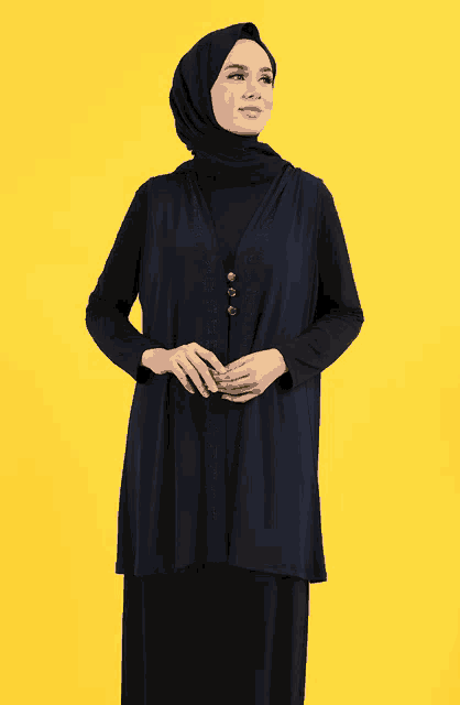 a woman wearing a black hijab and a blue vest is standing on a yellow background