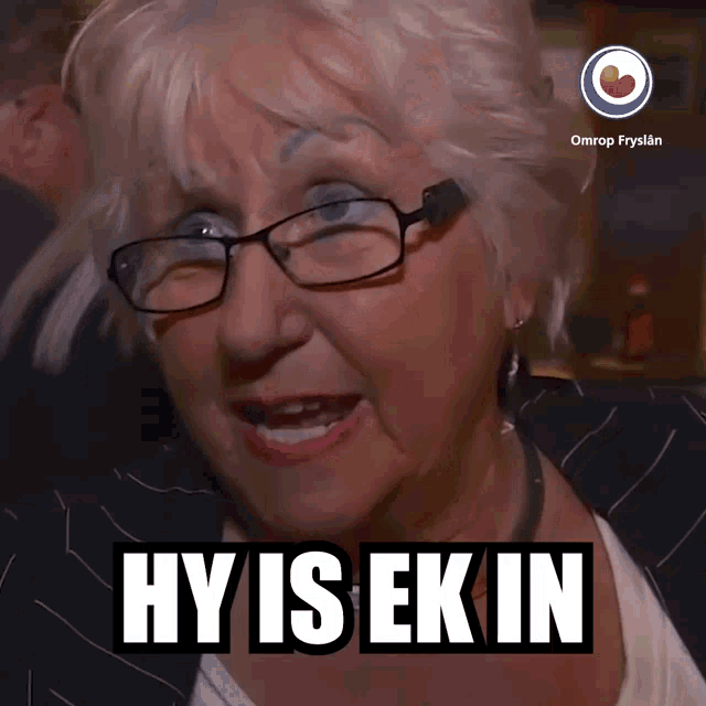 a woman with glasses says hy is ekin in a foreign language