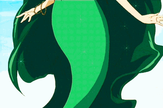 a woman in a green dress is standing in front of a white background
