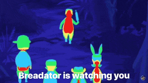 breadator is watching you with a cartoon character in the background