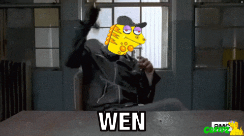 a cartoon character is sitting at a table and the word wen is on the table