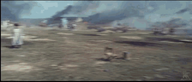 a group of soldiers marching in a field