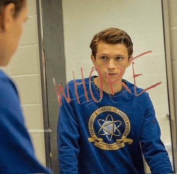 a boy wearing a blue shirt that says whore