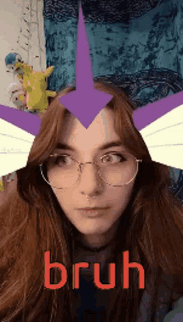 a woman wearing glasses has a purple arrow pointing to her head and the word bruh in red