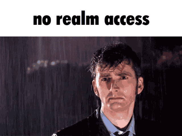 a man in a suit and tie is standing in the rain with the words no realm access below him .