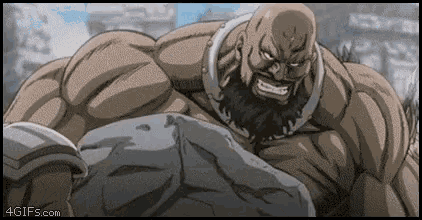 a very muscular man with a beard is holding a rock in his hands .