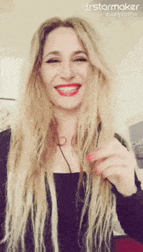 a woman with braces on her teeth is smiling with a starmaker watermark
