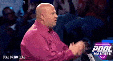 a bald man in a pink shirt is clapping in front of a pool masters logo