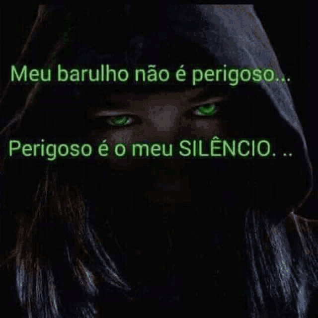 a woman with green eyes is wearing a black hood and a quote in spanish