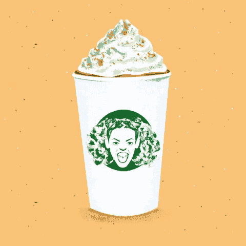 a starbucks coffee with whipped cream on top