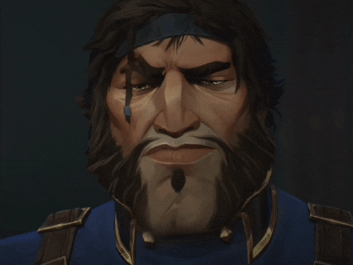 a man with a beard is wearing a blue shirt and gold trim
