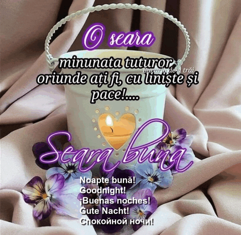 a picture of flowers and a candle that says seara buna on it