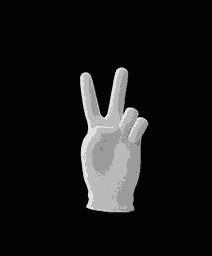 a white hand is giving a peace sign