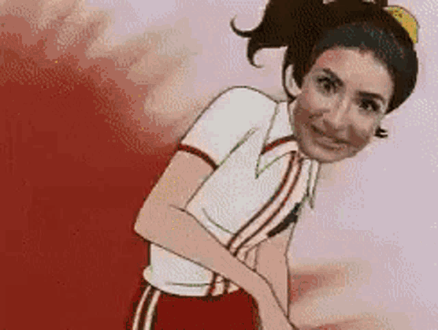 a woman in a white shirt and red shorts is smiling