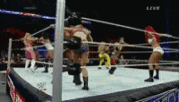 a group of women are wrestling in a ring with the word live on the bottom