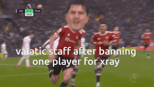 a soccer player kneeling on the field with the words " valatic staff after banning one player for xray " below him
