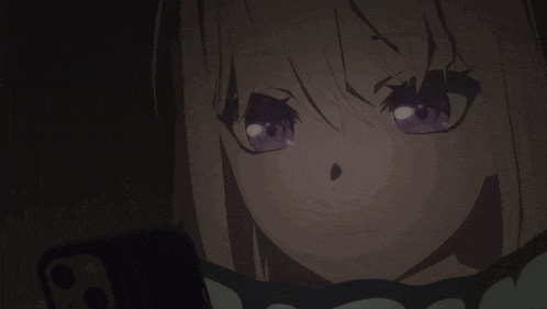 a close up of a girl with purple eyes looking at something