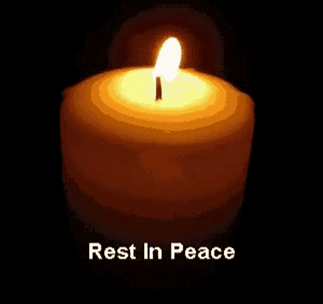 a picture of a lit candle with the words rest in peace above it