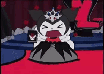a cartoon of a cat with a crown on its head sitting on a stage .