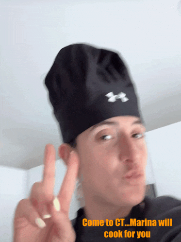 a man wearing a chef 's hat is giving a peace sign and says come to ct marina will cook for you