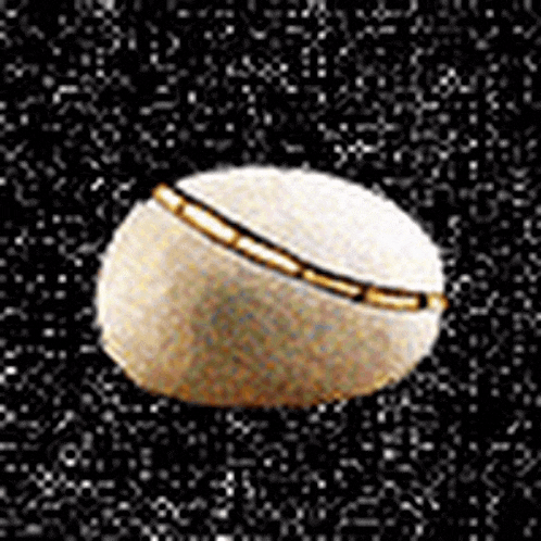 a tennis ball with a gold stripe on it