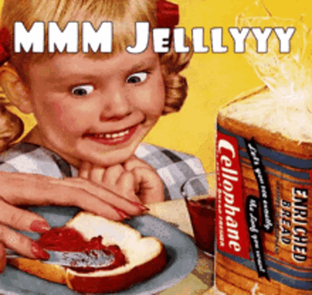 a little girl spreading jam on a piece of bread