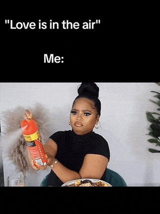 a woman is holding a spray bottle with the words " love is in the air " on it