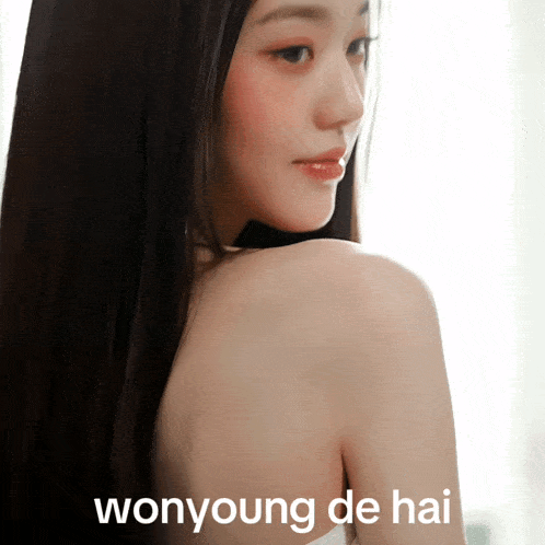 a woman 's shoulder is shown with the words wonyoung de hai below her