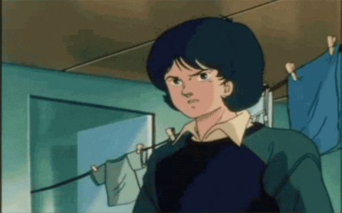 a cartoon character is standing next to a clothes line with clothes hanging on it