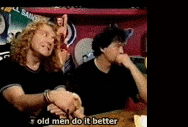 two men sitting at a table with the words old men do it better written on the bottom