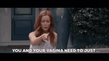 a woman in a white dress is pointing at the camera and says `` you and your vagina need to just ... ''