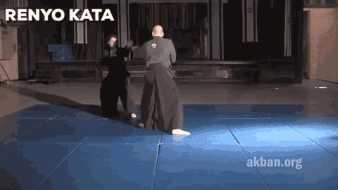a video of a man doing a karate move with the words renyo kata on the bottom