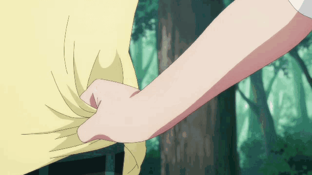 a woman 's hand is reaching into a man 's shirt