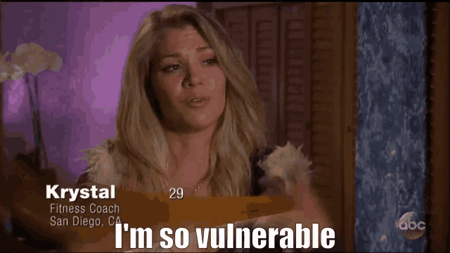 a woman says i 'm so vulnerable in front of a purple background