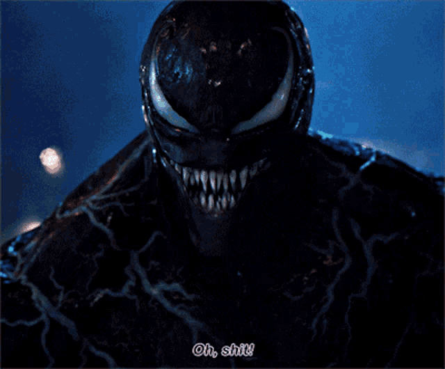 a close up of venom with the words oh shit written below him
