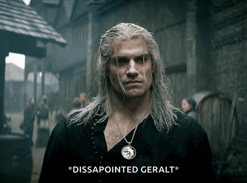a man with long white hair and a necklace that says " disappointed geralt " on the bottom