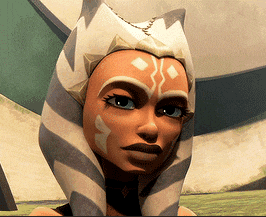 a close up of ahsoka tano from star wars wearing a striped head scarf