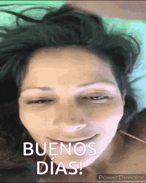a woman is smiling with the words buenos dias written below her
