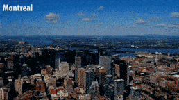 an aerial view of a city with the word montreal above it